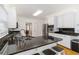 Well-lit kitchen with granite counters, stainless steel appliances, and hardwood floors at 2651 Briarlake Ne Rd, Atlanta, GA 30345