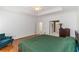 Spacious main bedroom with a sitting area, tray ceilings, and hardwood floors, creating a luxurious and inviting retreat at 2651 Briarlake Ne Rd, Atlanta, GA 30345