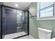 Modern bathroom features black framed glass enclosed shower and stylish fixtures at 2738 Westchester Dr, Atlanta, GA 30344