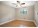Neutral bedroom with hardwood floors, ceiling fan, and natural light at 2738 Westchester Dr, Atlanta, GA 30344