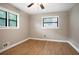 Bedroom featuring hardwood floors and natural light from two windows at 2738 Westchester Dr, Atlanta, GA 30344