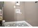 Laundry hookups shown with decorative tile flooring and neutral paint at 2738 Westchester Dr, Atlanta, GA 30344