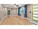 Bright and airy living room featuring hardwood floors, neutral walls, and sheer curtains at 2738 Westchester Dr, Atlanta, GA 30344