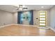 Cozy living room with hardwood floors, natural light, and contemporary ceiling fan at 2738 Westchester Dr, Atlanta, GA 30344