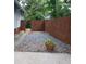 Charming backyard featuring a stone-paved path and lush landscaping at 959 Berne Se St, Atlanta, GA 30316