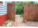 Scenic backyard with a stone-paved walkway and privacy fence at 959 Berne Se St, Atlanta, GA 30316