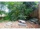 Relaxing backyard retreat with a stone bench and brick-paved area at 959 Berne Se St, Atlanta, GA 30316