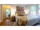 Bright bedroom featuring a cozy bed, stylish decor, and natural light at 959 Berne Se St, Atlanta, GA 30316