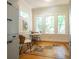 Bright breakfast nook with three windows, hardwood floors, and small table at 959 Berne Se St, Atlanta, GA 30316