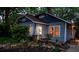 Charming home with well-lit windows, manicured landscaping, and a welcoming front porch at 959 Berne Se St, Atlanta, GA 30316
