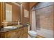 Cozy bathroom featuring a vanity with granite countertop, tub, and stylish fixtures at 106 Stephens Farm Dr, Canton, GA 30115