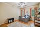 Bright bedroom featuring hardwood floors, natural light, and workspace at 106 Stephens Farm Dr, Canton, GA 30115