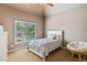 Bedroom with a white bed, neutral walls, carpeted floor, and a window with shutters at 106 Stephens Farm Dr, Canton, GA 30115