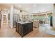 Bright, modern kitchen with large island, stainless appliances, and breakfast nook at 106 Stephens Farm Dr, Canton, GA 30115