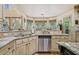 Well-lit kitchen featuring granite countertops and stainless steel dishwasher at 106 Stephens Farm Dr, Canton, GA 30115