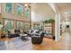 Spacious living room features hardwood floors, high ceilings, and natural light at 106 Stephens Farm Dr, Canton, GA 30115