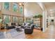 Bright living room with soaring ceilings, hardwood floors, and an open floor plan at 106 Stephens Farm Dr, Canton, GA 30115
