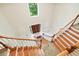 Grand foyer with a soaring ceiling, wood staircase, and double doors at 5105 Jett Forest Trl, Atlanta, GA 30327
