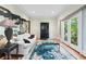 Bright living room with hardwood floors, elegant furniture and natural light at 5105 Jett Forest Trl, Atlanta, GA 30327