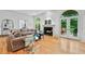 Spacious living room featuring hardwood floors, fireplace and french doors at 5105 Jett Forest Trl, Atlanta, GA 30327