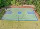 Overhead view of the community basketball court and well-maintained surrounding landscaping at 1435 Harburn Ct, Cumming, GA 30041
