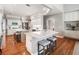 Spacious kitchen with dual islands, white cabinets, and stainless steel appliances at 1435 Harburn Ct, Cumming, GA 30041