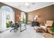 Inviting home office space with ample natural light and a cozy seating area at 1435 Harburn Ct, Cumming, GA 30041