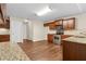 Kitchen featuring granite counters, hardwood floors, stainless appliances and eating area at 2055 Hickory Station Cir, Snellville, GA 30078
