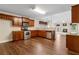 Modern kitchen featuring stainless steel appliances, granite countertops and access to living area at 2055 Hickory Station Cir, Snellville, GA 30078