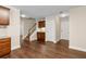 View of the kitchen with desk, entry door and staircase at 2055 Hickory Station Cir, Snellville, GA 30078