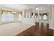 Spacious living area with hardwood floors, wainscoting and bright light at 2055 Hickory Station Cir, Snellville, GA 30078