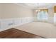 Bright living area with neutral walls, carpet and natural light at 2055 Hickory Station Cir, Snellville, GA 30078