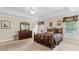 Spacious main bedroom with tray ceiling, natural light, and room for furnishings at 2055 Hickory Station Cir, Snellville, GA 30078