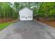Spacious detached two-car garage with ample parking space and a private entrance at 607 Hickory Creek Ln, Woodstock, GA 30188