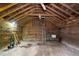 Spacious interior with exposed wooden beams, concrete floor and natural walls at 980 Oakton Sw Dr, Marietta, GA 30060