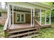 An inviting screened porch and a step-down deck creates an ideal space for enjoying the outdoors at 980 Oakton Sw Dr, Marietta, GA 30060
