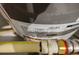 Close-up of a water heater featuring installation and manufacturing labels at 242 Riverstone Pl, Canton, GA 30114