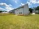 A spacious backyard with new fencing is perfect for pets or children at 4935 Bellehurst Ln, Cumming, GA 30040