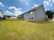 Spacious backyard featuring lush green grass and a new wooden fence creating a private outdoor space at 4935 Bellehurst Ln, Cumming, GA 30040