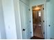 Bathroom featuring walk-in shower with glass doors and modern fixtures at 4935 Bellehurst Ln, Cumming, GA 30040
