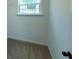 Walk-in closet featuring window and carpet floor at 4935 Bellehurst Ln, Cumming, GA 30040