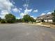 Community clubhouse with sidewalks, ample parking, and landscaping at 4935 Bellehurst Ln, Cumming, GA 30040