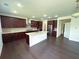 Modern kitchen featuring stainless steel appliances, granite countertops and large island at 4935 Bellehurst Ln, Cumming, GA 30040