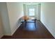 Bright office space with a minimalist desk and a window allowing natural light at 4935 Bellehurst Ln, Cumming, GA 30040