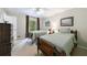 Comfortable bedroom with two twin beds, natural light, and a neutral color scheme at 4311 N Elizabeth Se Ln, Atlanta, GA 30339