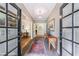 Elegant foyer featuring brick flooring, stylish furnishings, and ample natural light at 4311 N Elizabeth Se Ln, Atlanta, GA 30339