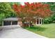 Lovely home with a well maintained lawn and oversized two car garage at 4311 N Elizabeth Se Ln, Atlanta, GA 30339