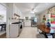 Bright kitchen with white cabinetry, stainless steel appliances, and an eat-in breakfast nook at 4311 N Elizabeth Se Ln, Atlanta, GA 30339