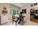 Sunlit kitchen nook with a breakfast table and view of the backyard deck at 4311 N Elizabeth Se Ln, Atlanta, GA 30339