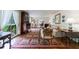 Bright living room showcasing hardwood floors, large windows, and classic décor at 4311 N Elizabeth Se Ln, Atlanta, GA 30339